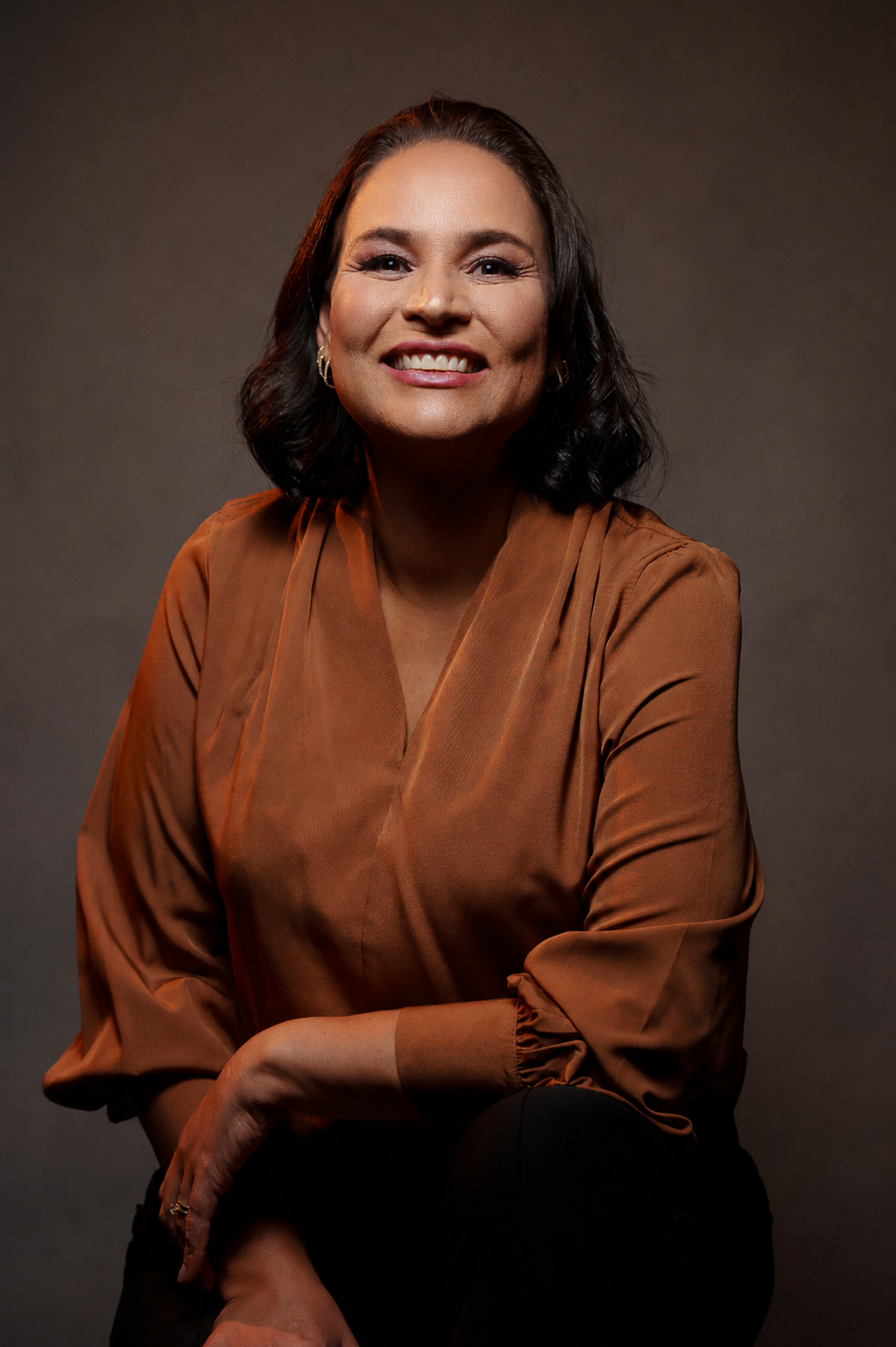 Retrato profissional da cirurgiã-dentista Dra. Carla Stohler Paresque
